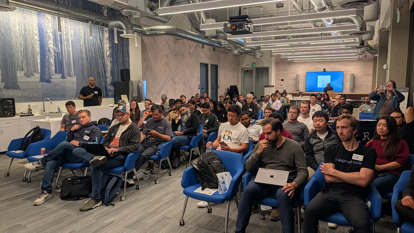 Attendees seated with laptops and notebooks at Coding Agents: Lightning Talks in Palo Alto.