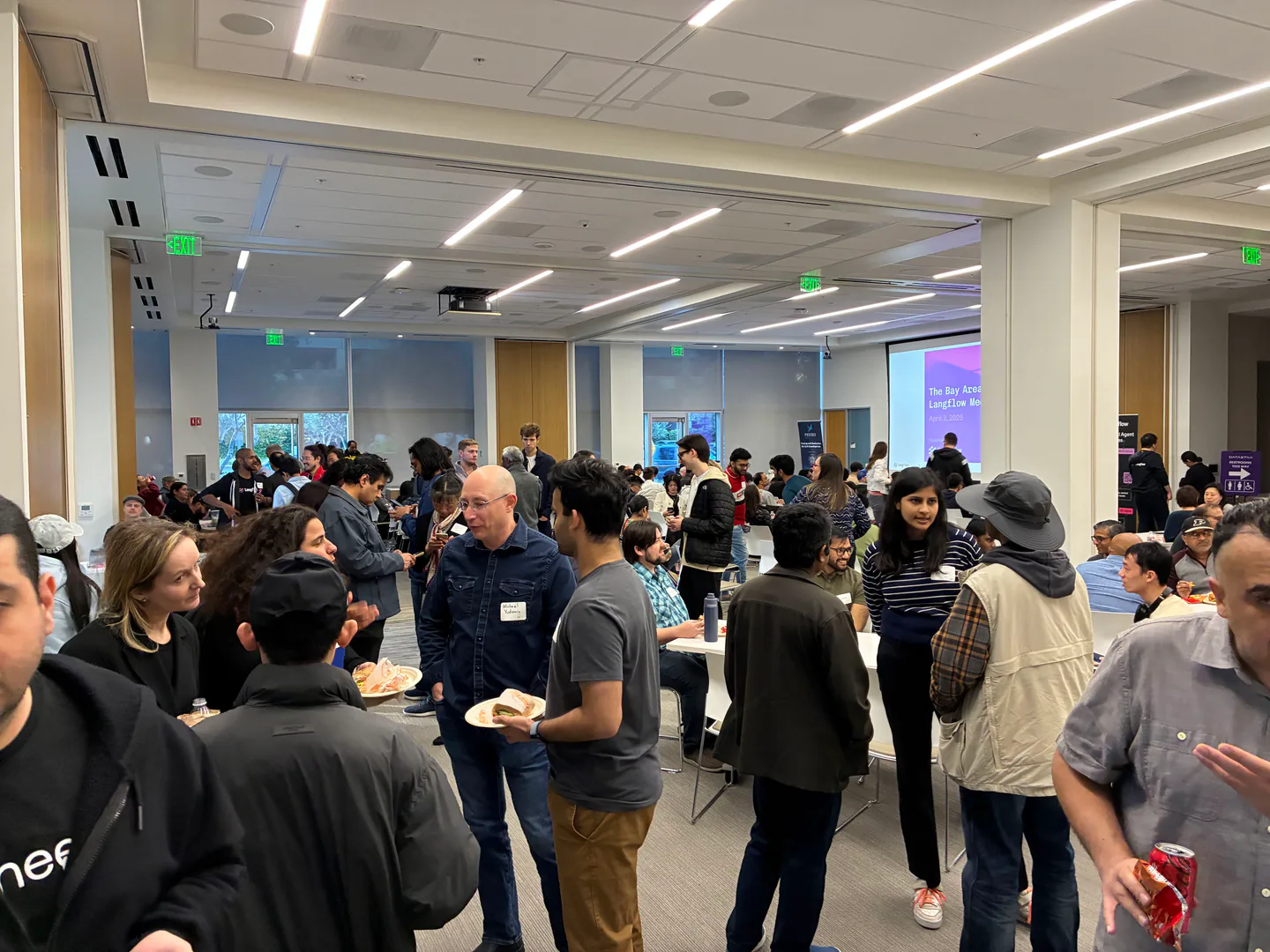 Attendees talking and meeting each other at the Langflow and DataStax tech talk and social.