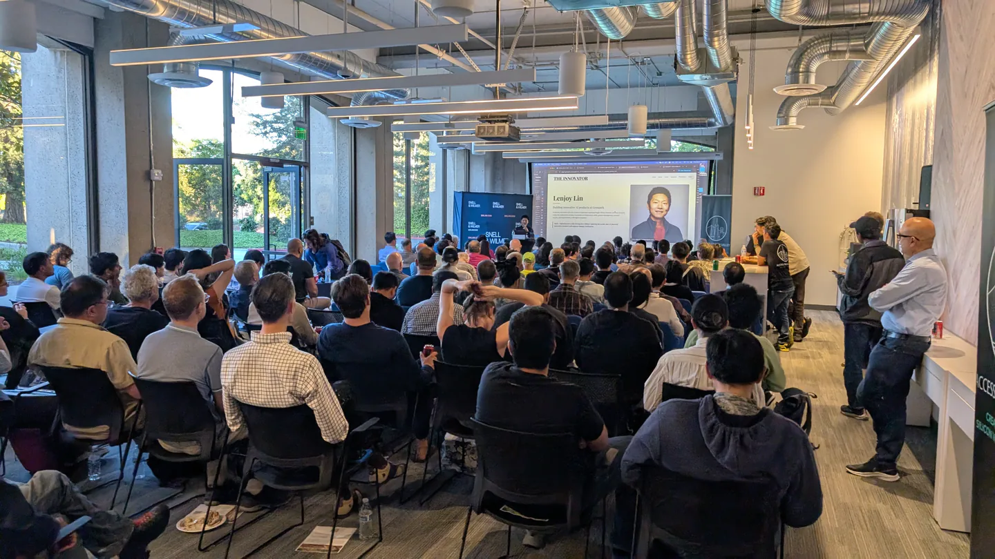 A packed audience listening to Genspark present at our AI Agents event.